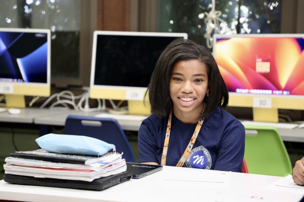 Middle school student smiling