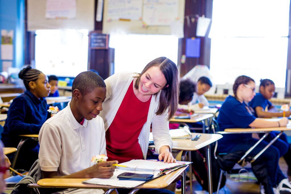 Teacher with high school student