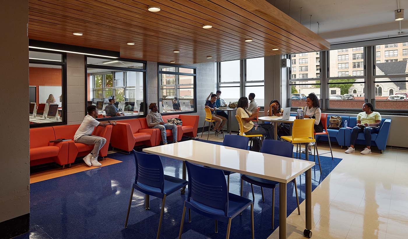 Science Leadership Academy Ben Franklin High School Swing Space Student sitting in lounge chairs
